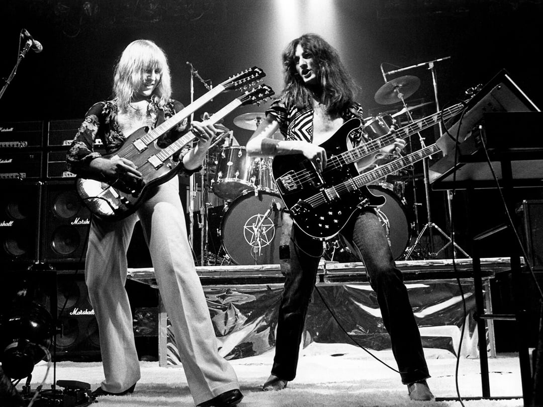 alex-lifeson-geddy-lee-of-rush-playing-double-neck-guitars-v0-fziqjjpyc31b1.jpg